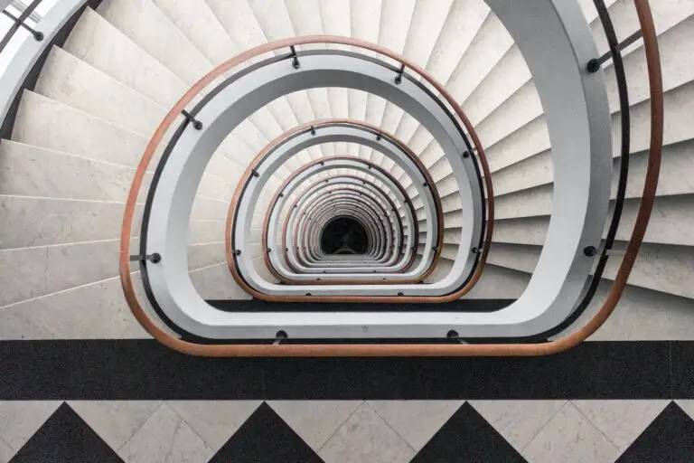 white and brown spiral stairs with no people