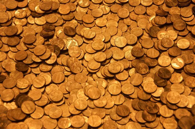 brown round coins on brown wooden surface