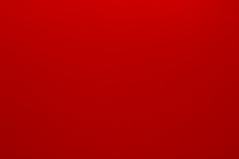 red textile in close up photography